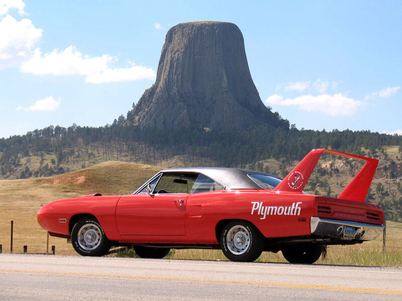 Red Plymouth car at Devil's Tower