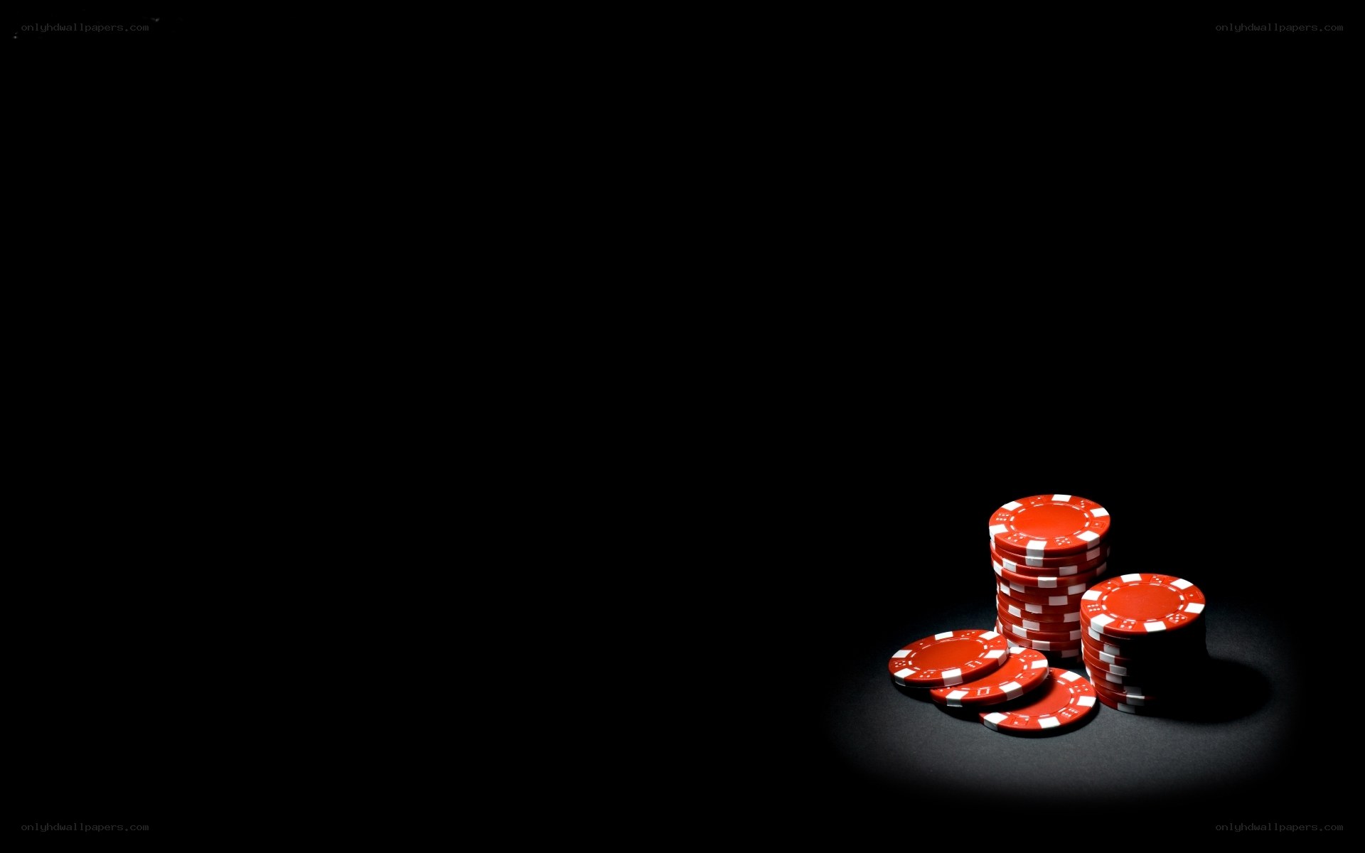 red poker chips on black