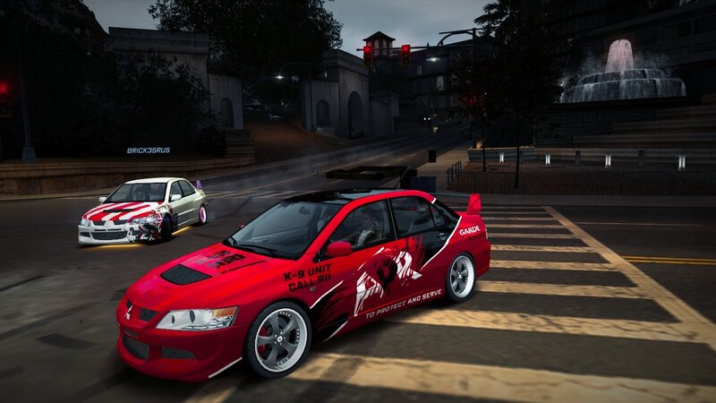 Red police car in city street