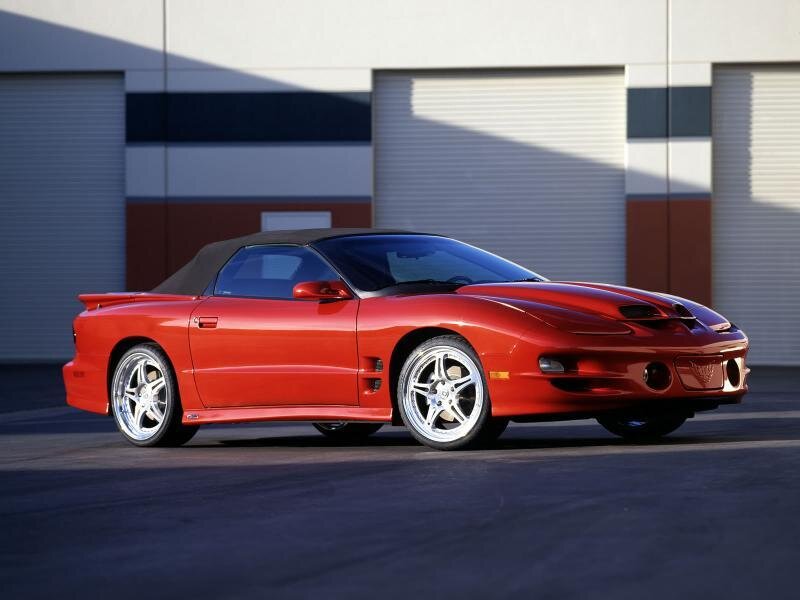 Red Pontiac Firebird convertible