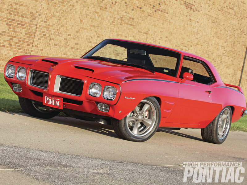 Red Pontiac Firebird — Dramatic, Afternoon, Photograph, Brick Wall