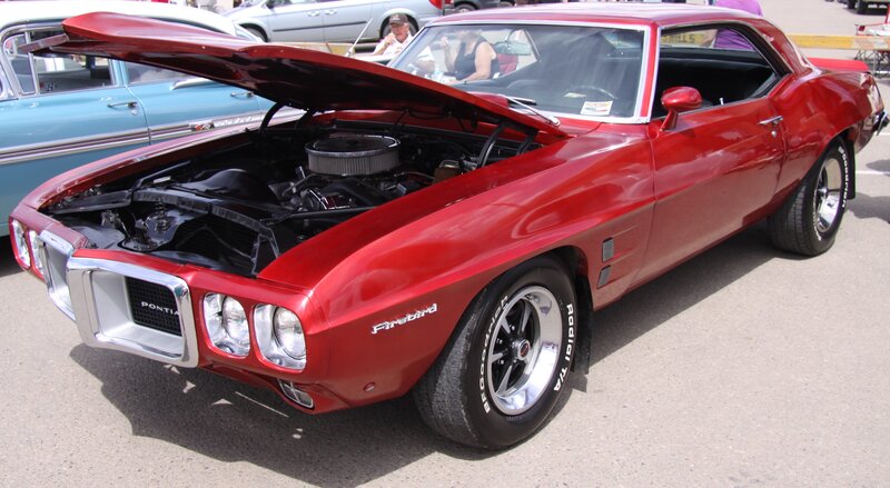 Red Pontiac Firebird — Showcase, Afternoon