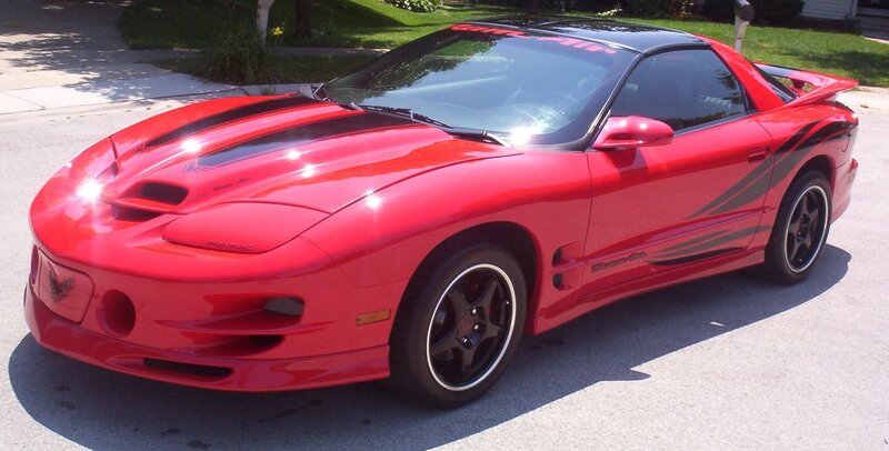 red pontiac firebird sports car