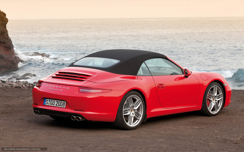 Red Porsche 911 Cabriolet by the sea