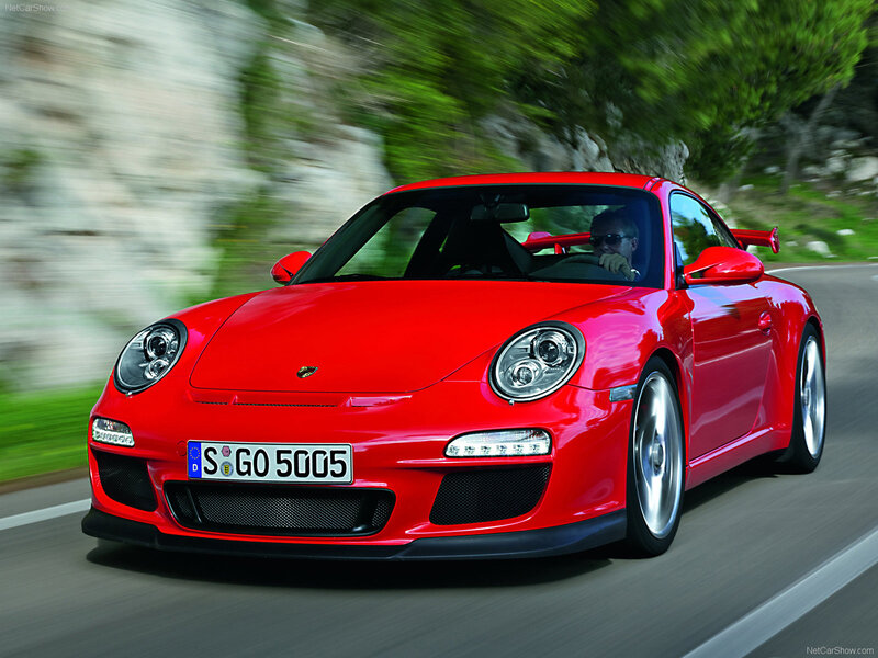 Red Porsche 911 GT3 in motion