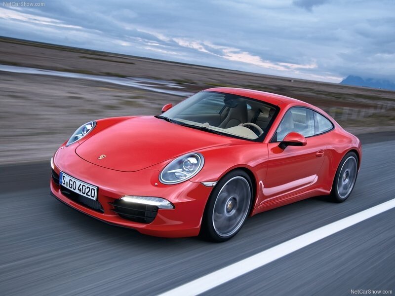 Red Porsche 911 in motion