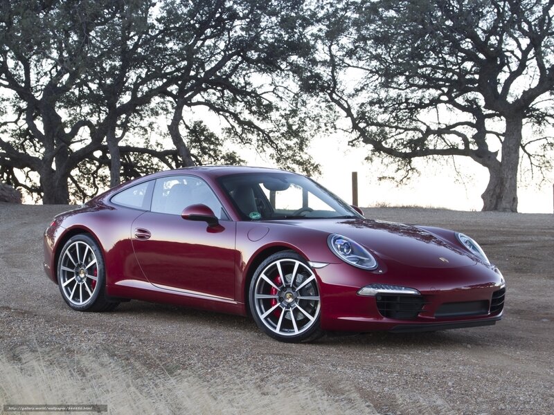 Red Porsche 911 on a dirt road