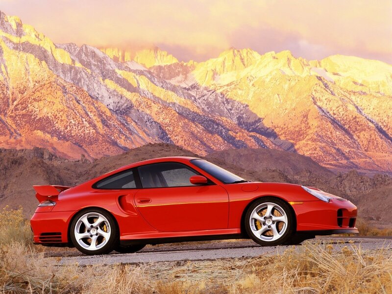 Red Porsche 911 Turbo in mountains