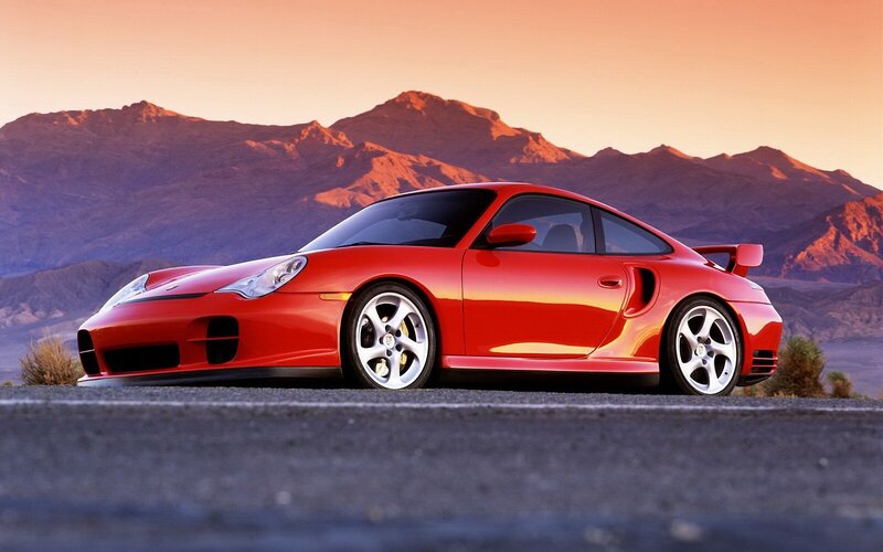 Red Porsche 911 Turbo on desert road