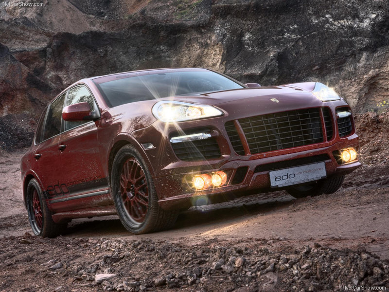 red porsche cayenne in rocky terrain