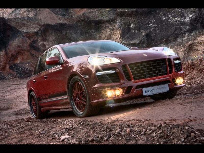 Red Porsche Cayenne off-road