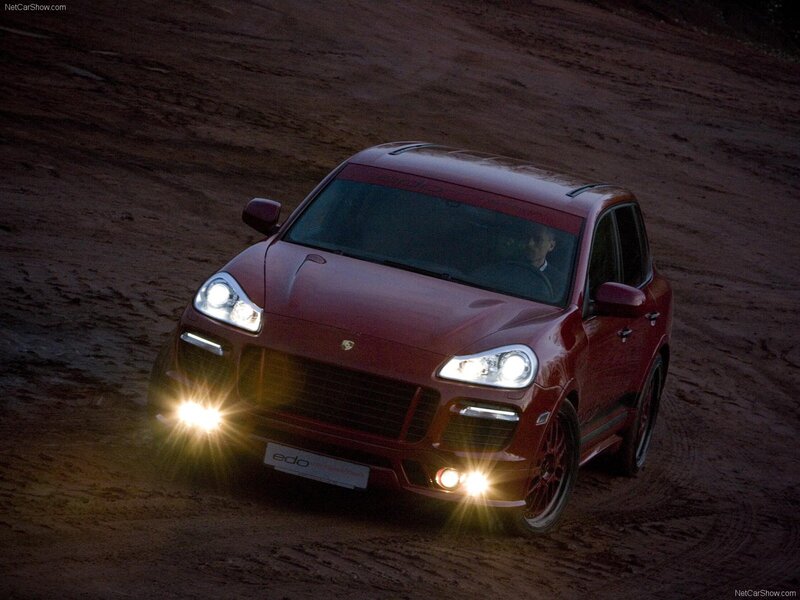 red porsche cayenne on dirt road