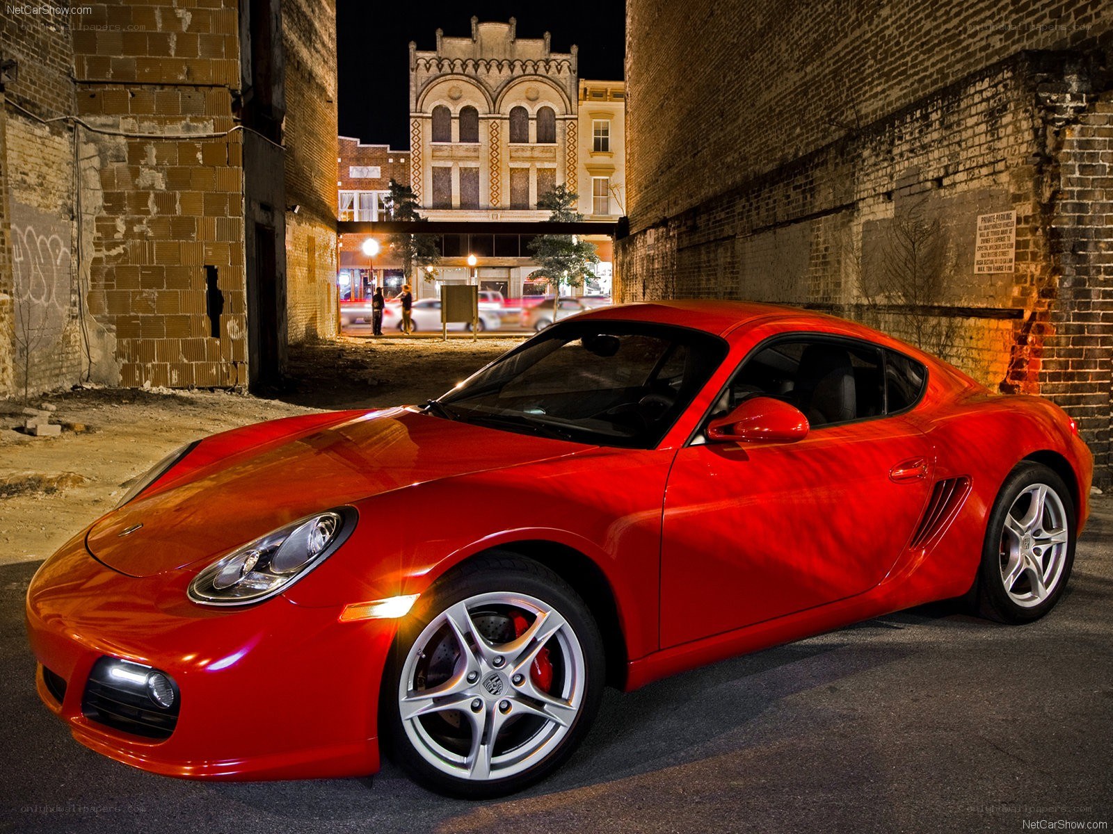 Red Porsche Cayman at night