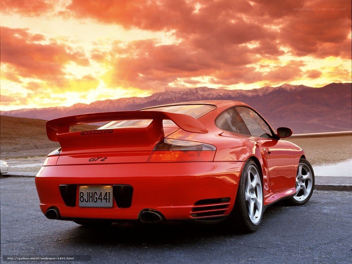 Red Porsche GT2 at sunset