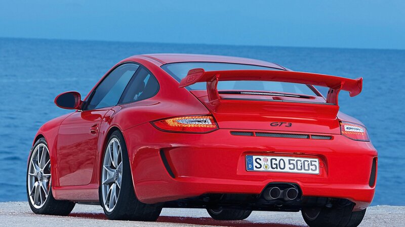 Red Porsche GT3 by the sea