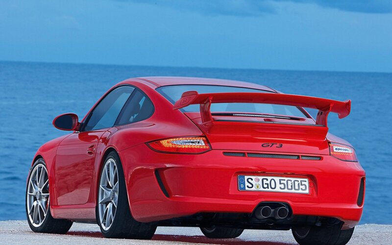 Red Porsche GT3 by the sea