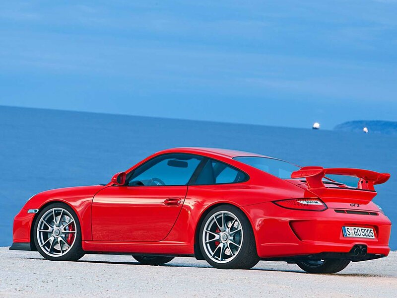 Red Porsche GT3 by the sea