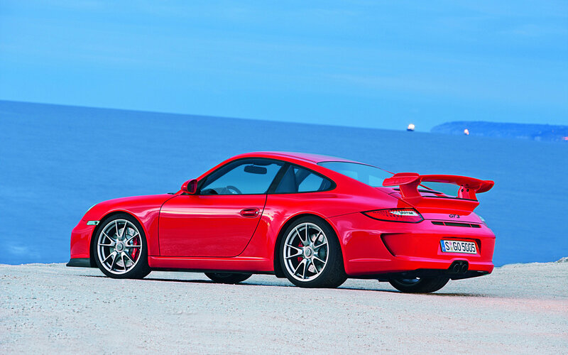 Red Porsche GT3 by the sea