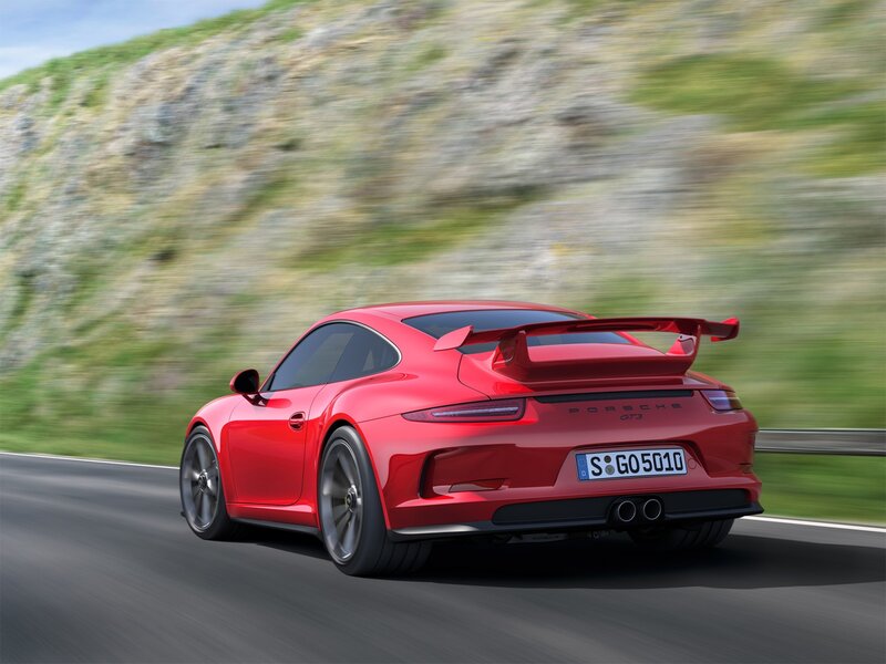 Red Porsche GT3 on a mountain road