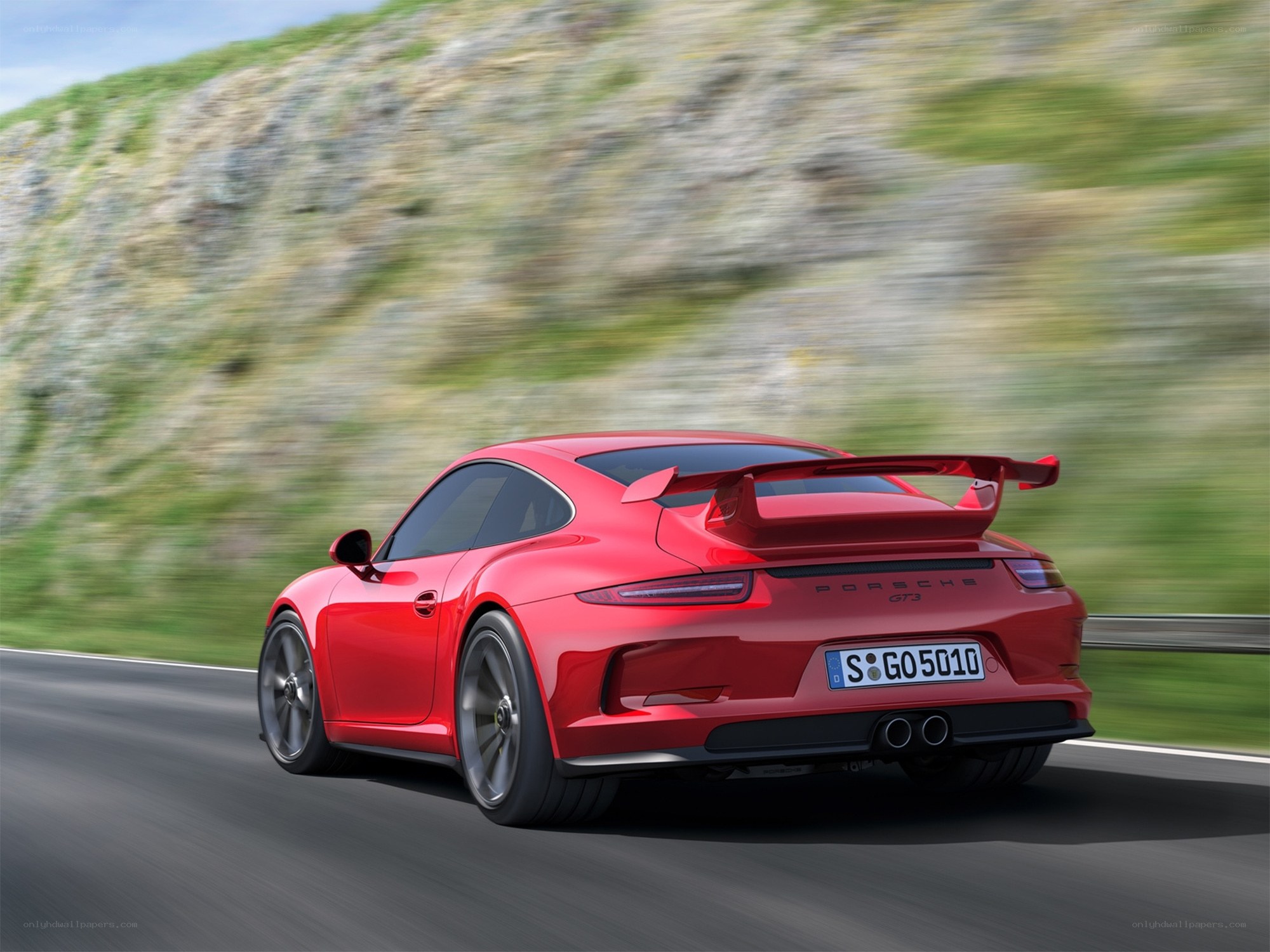 Red Porsche GT3 on a mountain road