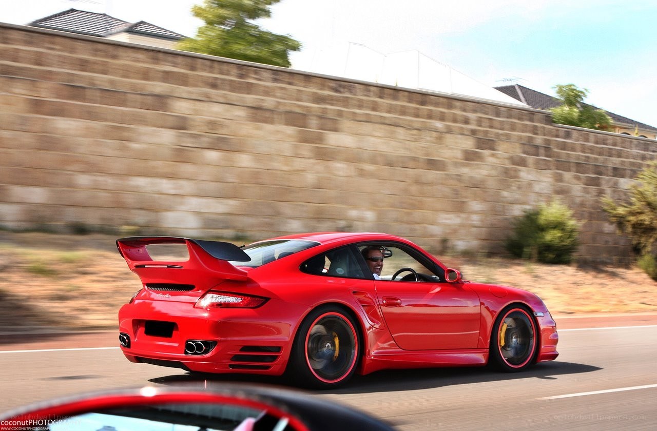 red porsche in motion