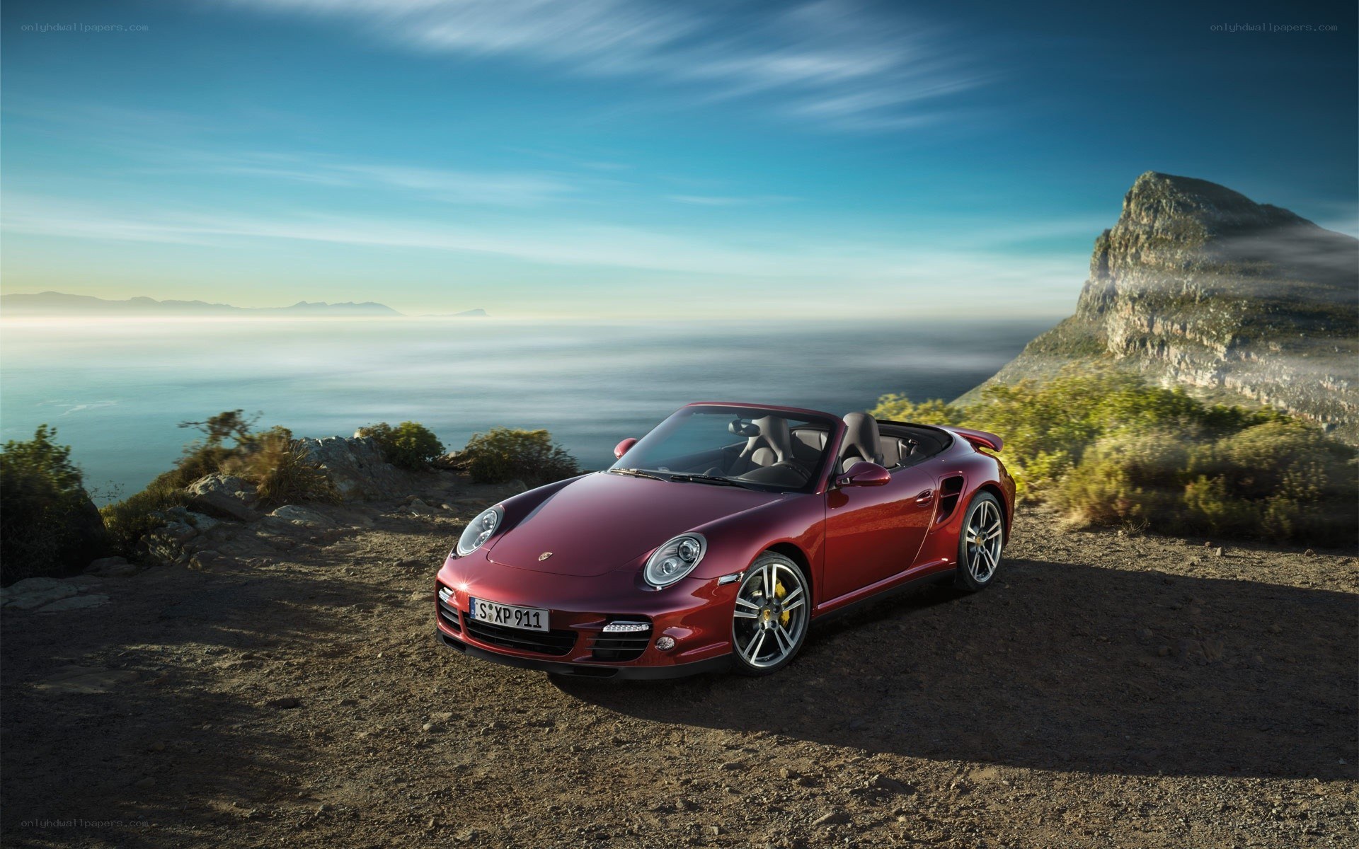 Red Porsche on a cliff