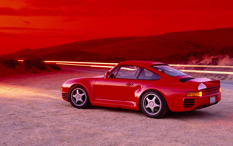 Red Porsche on a desert road