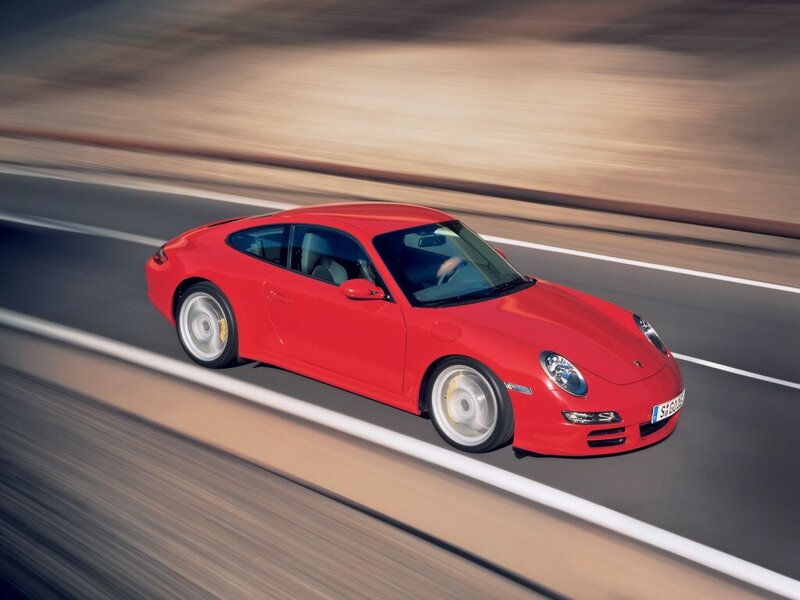 Red Porsche on a highway