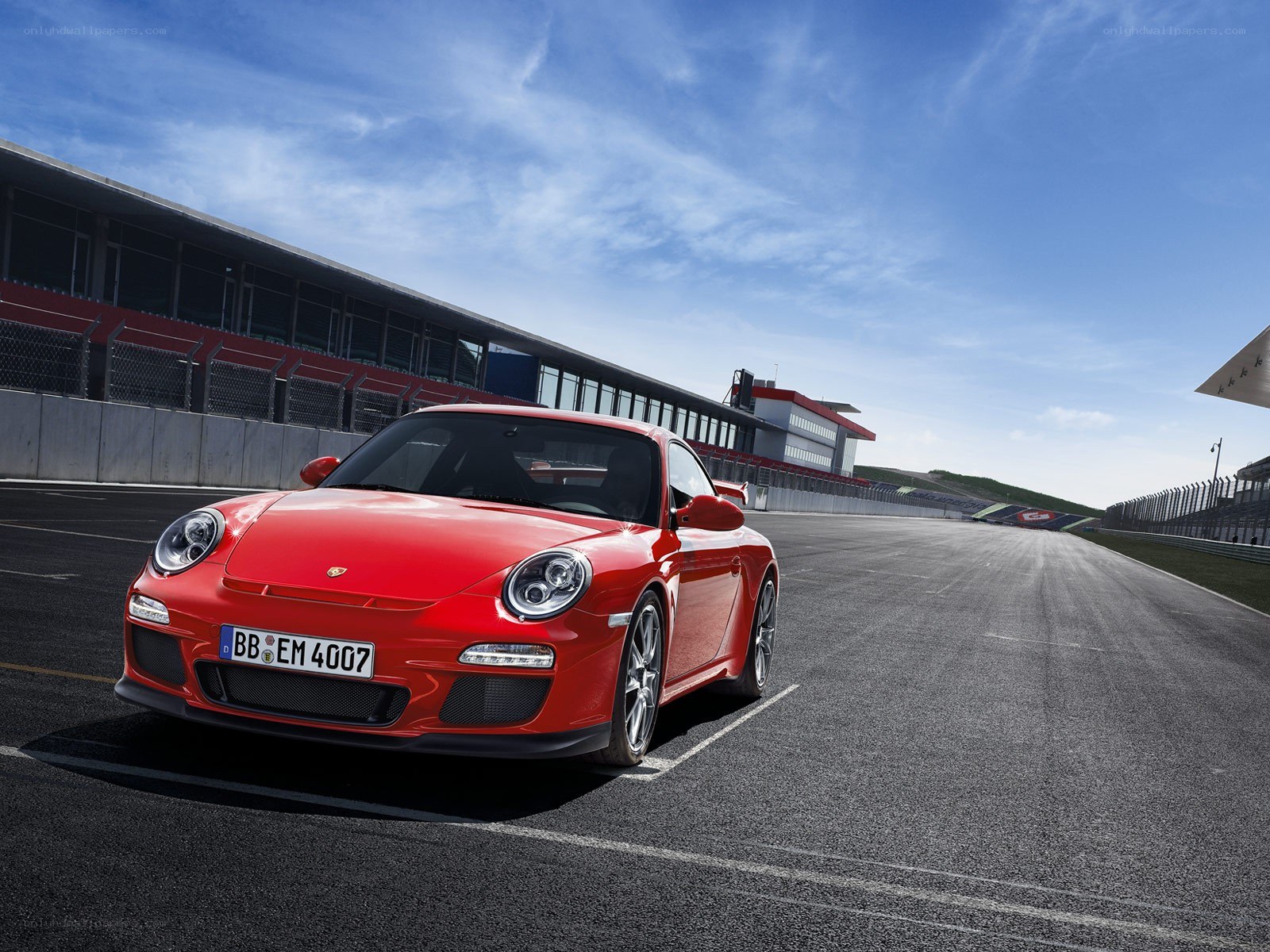 Red Porsche on a racetrack
