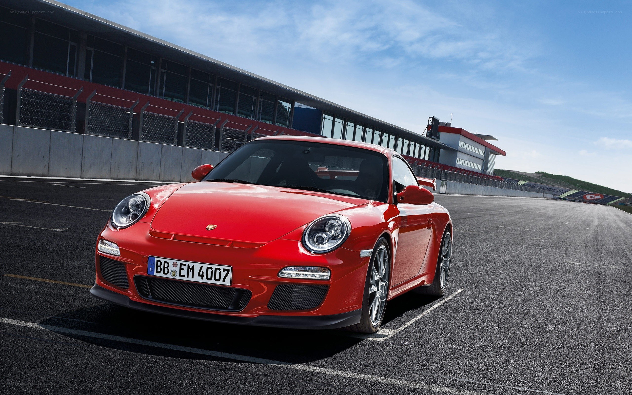 Red Porsche on a racetrack