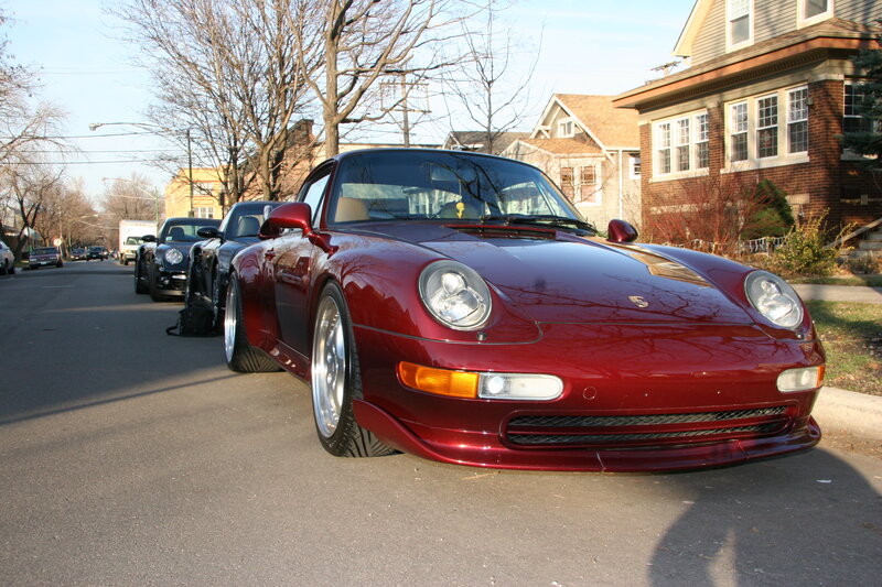 Red Porsche on a residential street