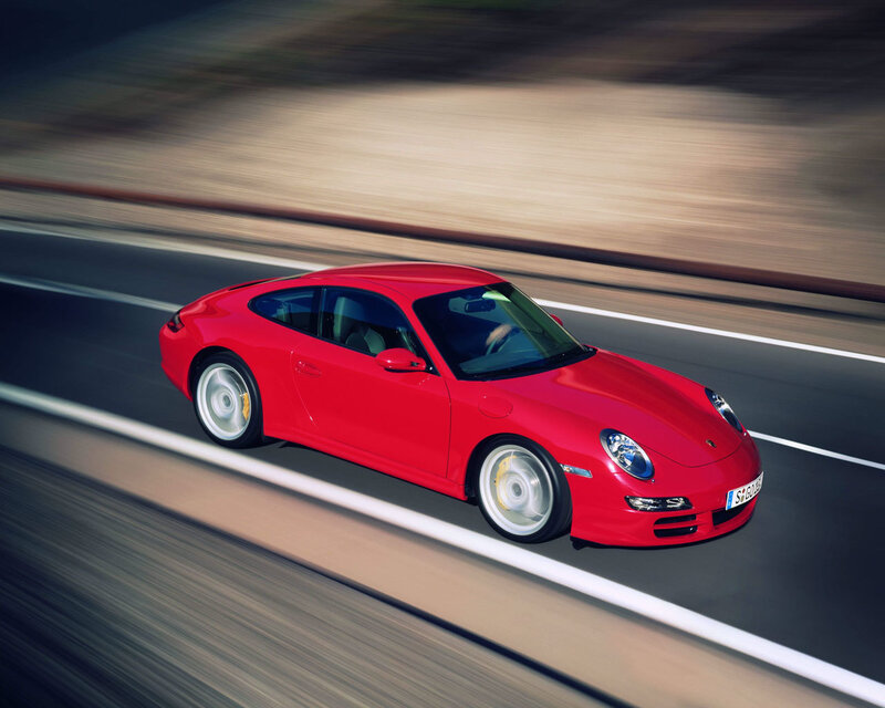 Red Porsche on a road
