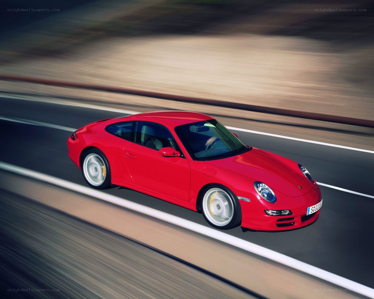 Red Porsche on a road