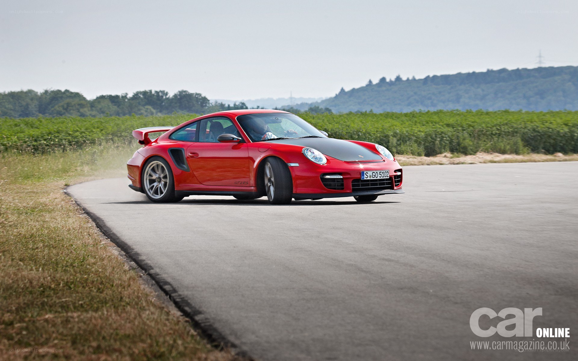 Red Porsche on a track