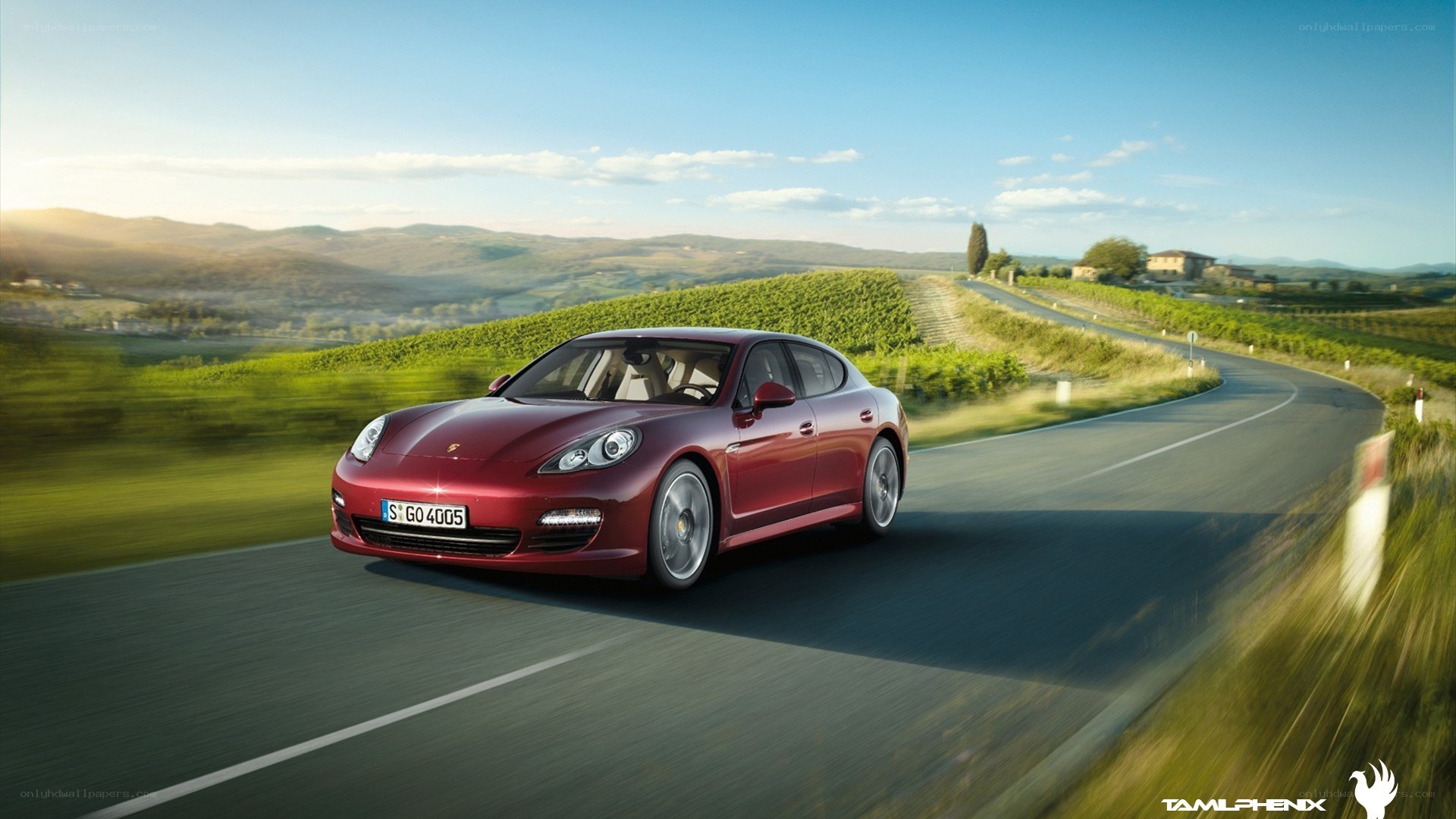Red Porsche on a winding road