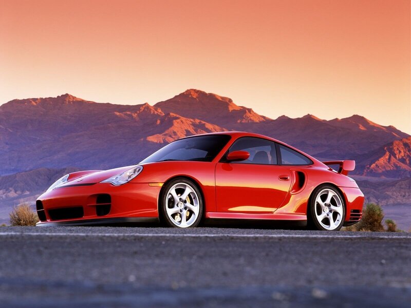 Red Porsche on desert road