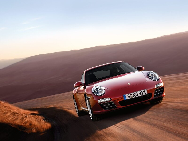 Red Porsche on desert road