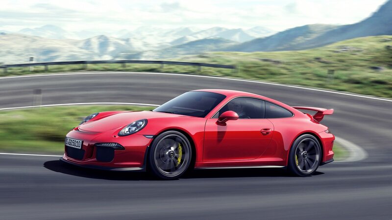 Red Porsche on mountain road