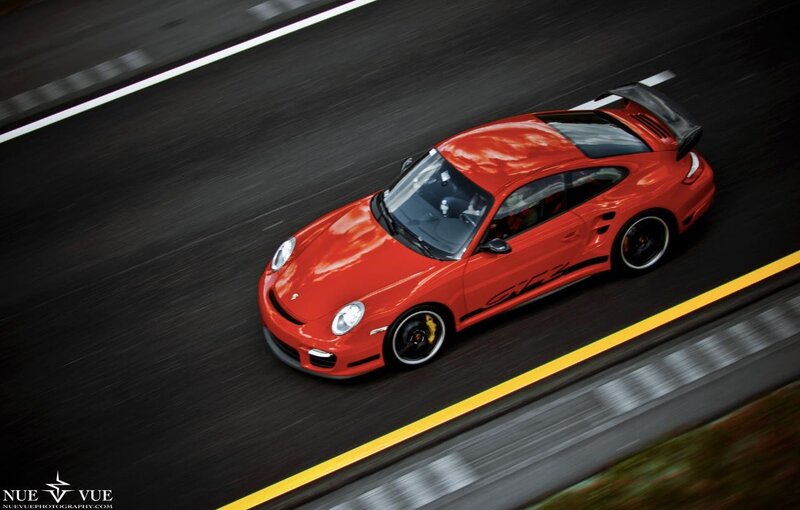 red porsche on racetrack