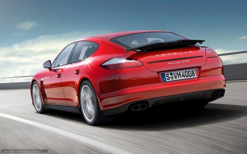 Red Porsche Panamera GTS in motion