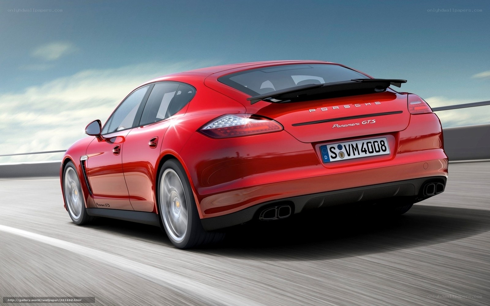 Red Porsche Panamera GTS in motion