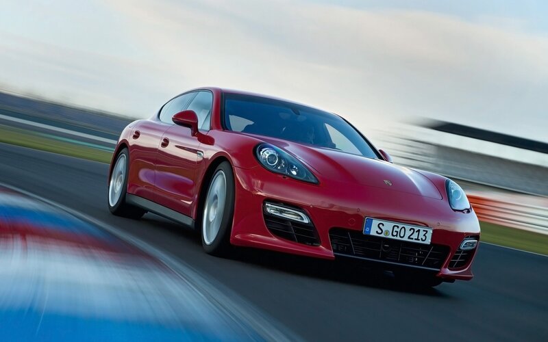Red Porsche Panamera on a racetrack