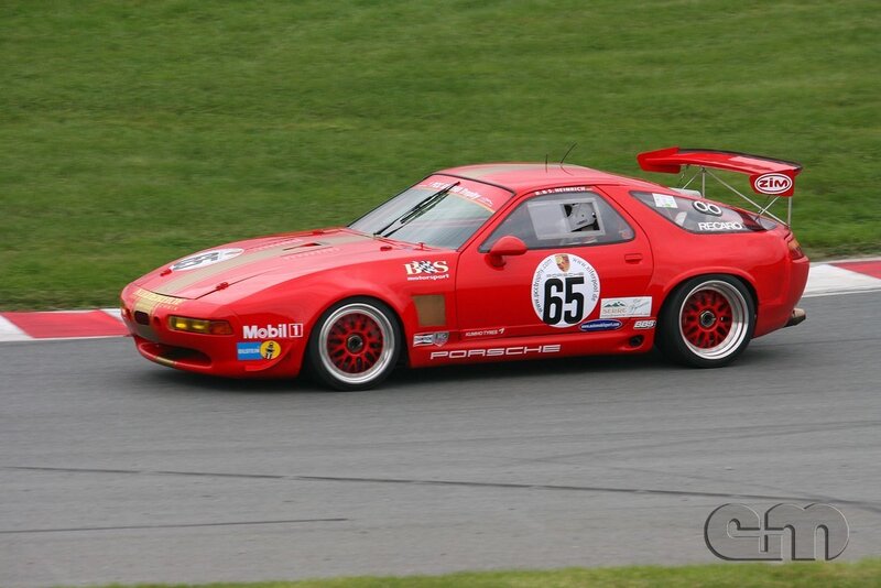 Red Porsche race car on track