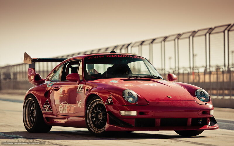 Red Porsche race car on track