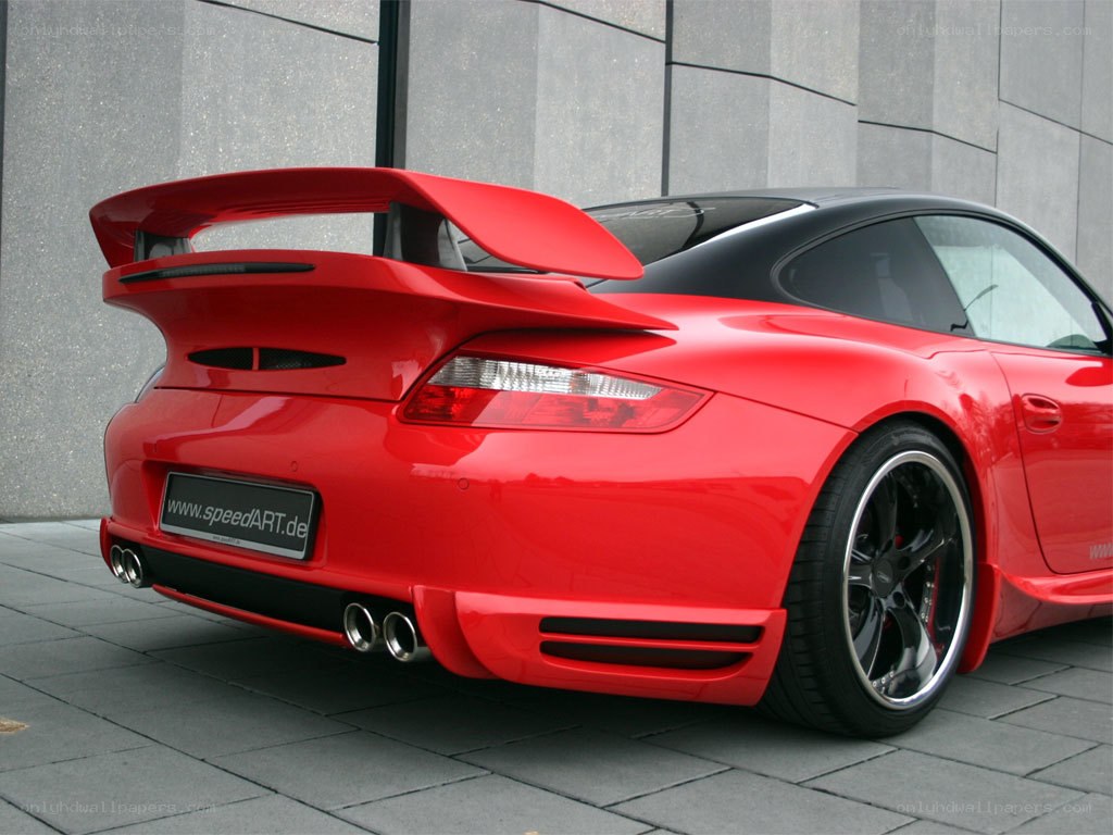 Red Porsche with large rear wing
