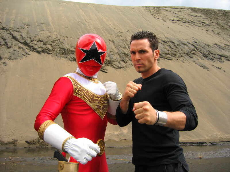 Red Power Ranger with man in desert