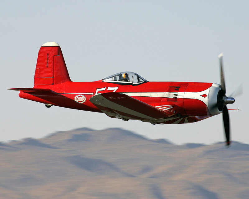 Red Propeller Airplane — Dynamic, Afternoon