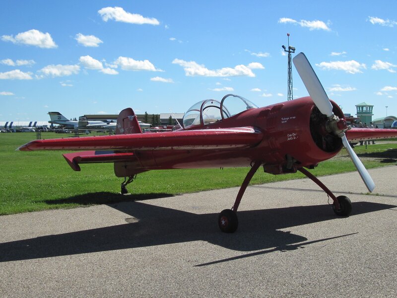Red Propeller Airplane — Outdoor, Afternoon