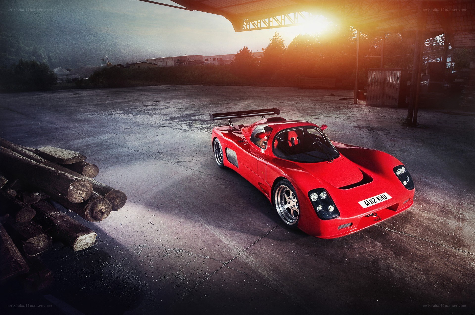 Red race car at sunset