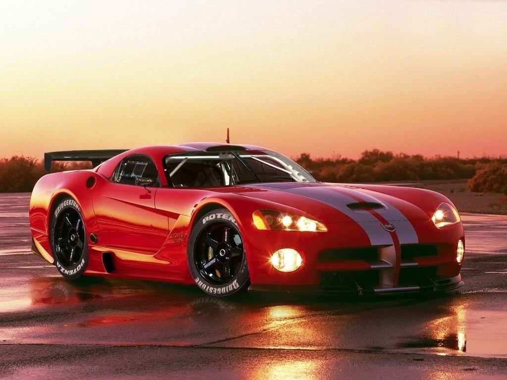 Red race car at sunset